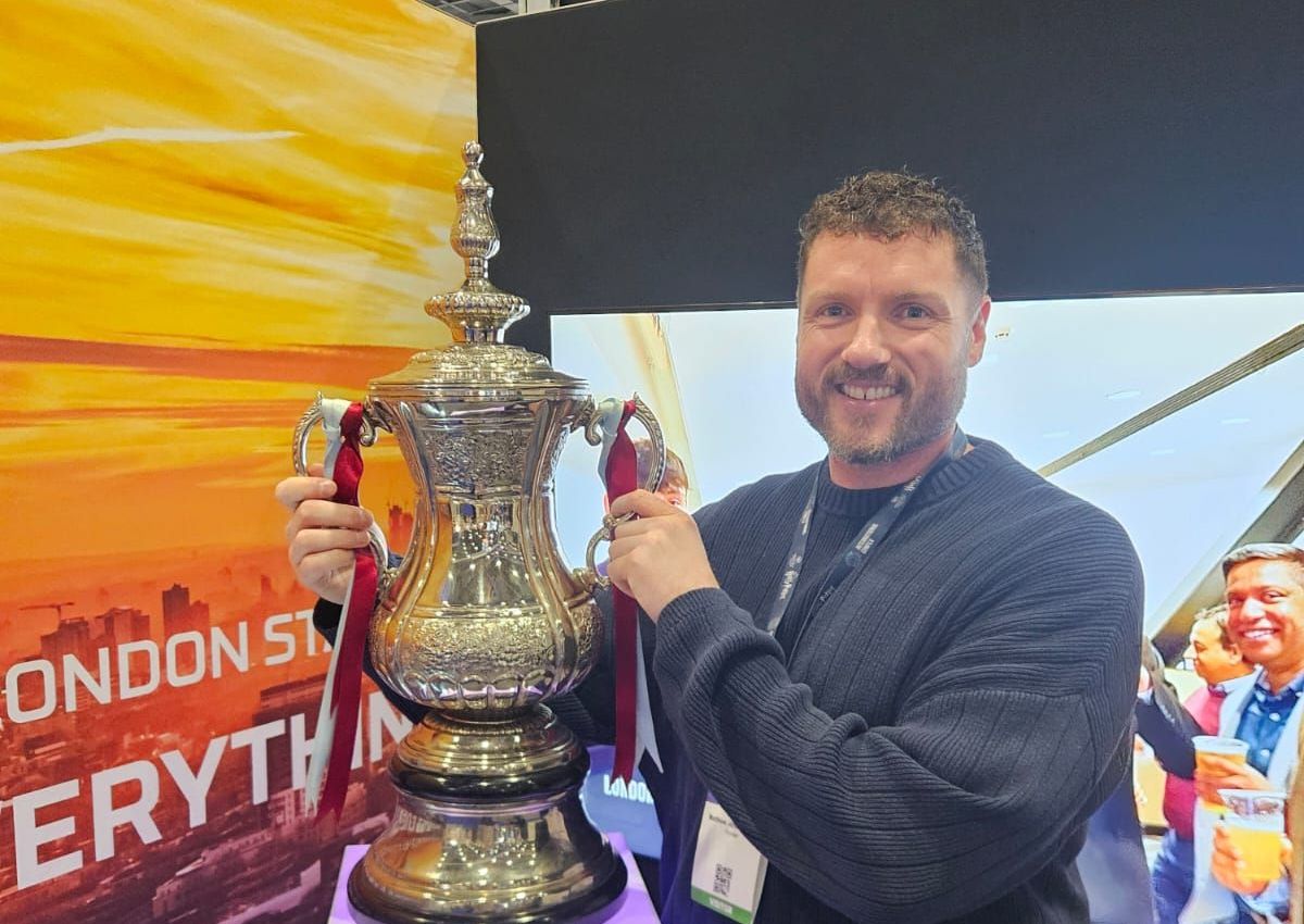 With the FA Cup at an events conference