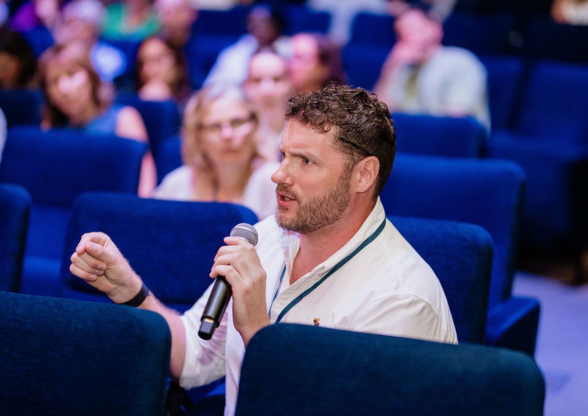 Putting a question from the floor at the Business of Events Policy Forum